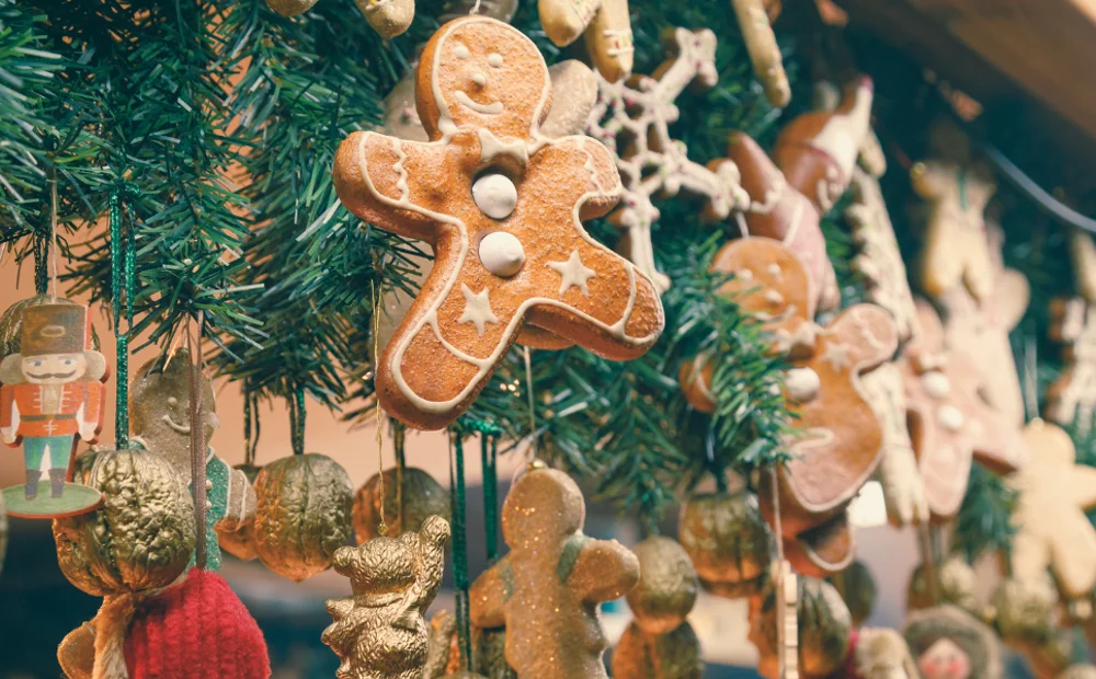 gingerbread cookie ornaments hanging on garland gingerbread cookie ornaments hanging on garland