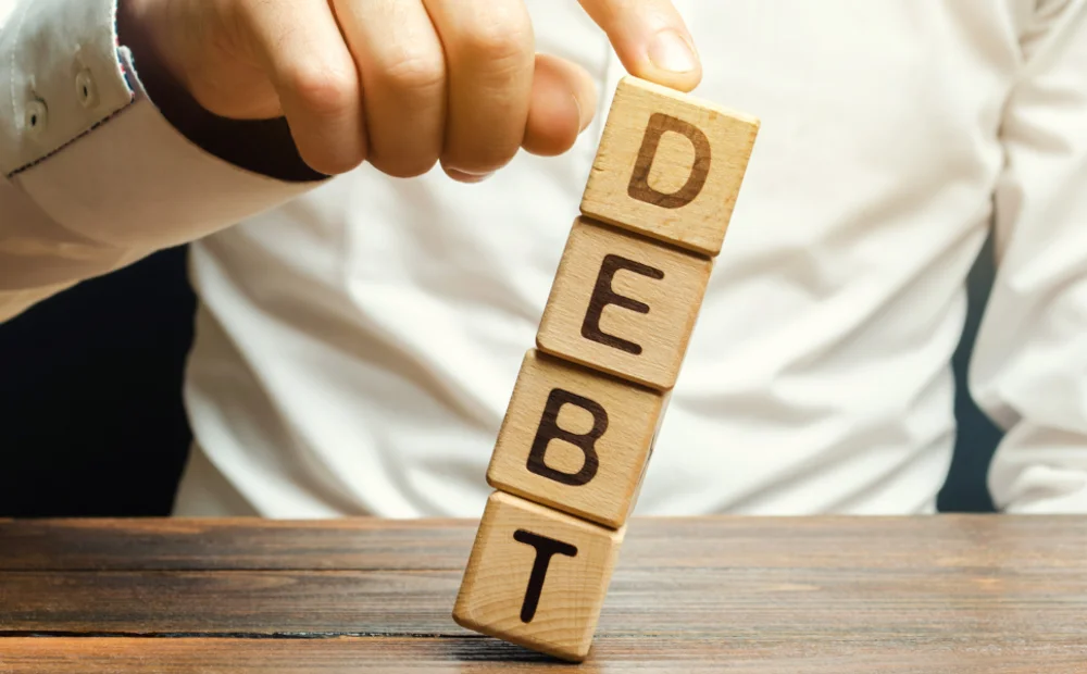 blocks spelling out debt blocks spelling out debt