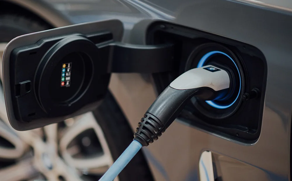 charger plugged into car charger plugged into car