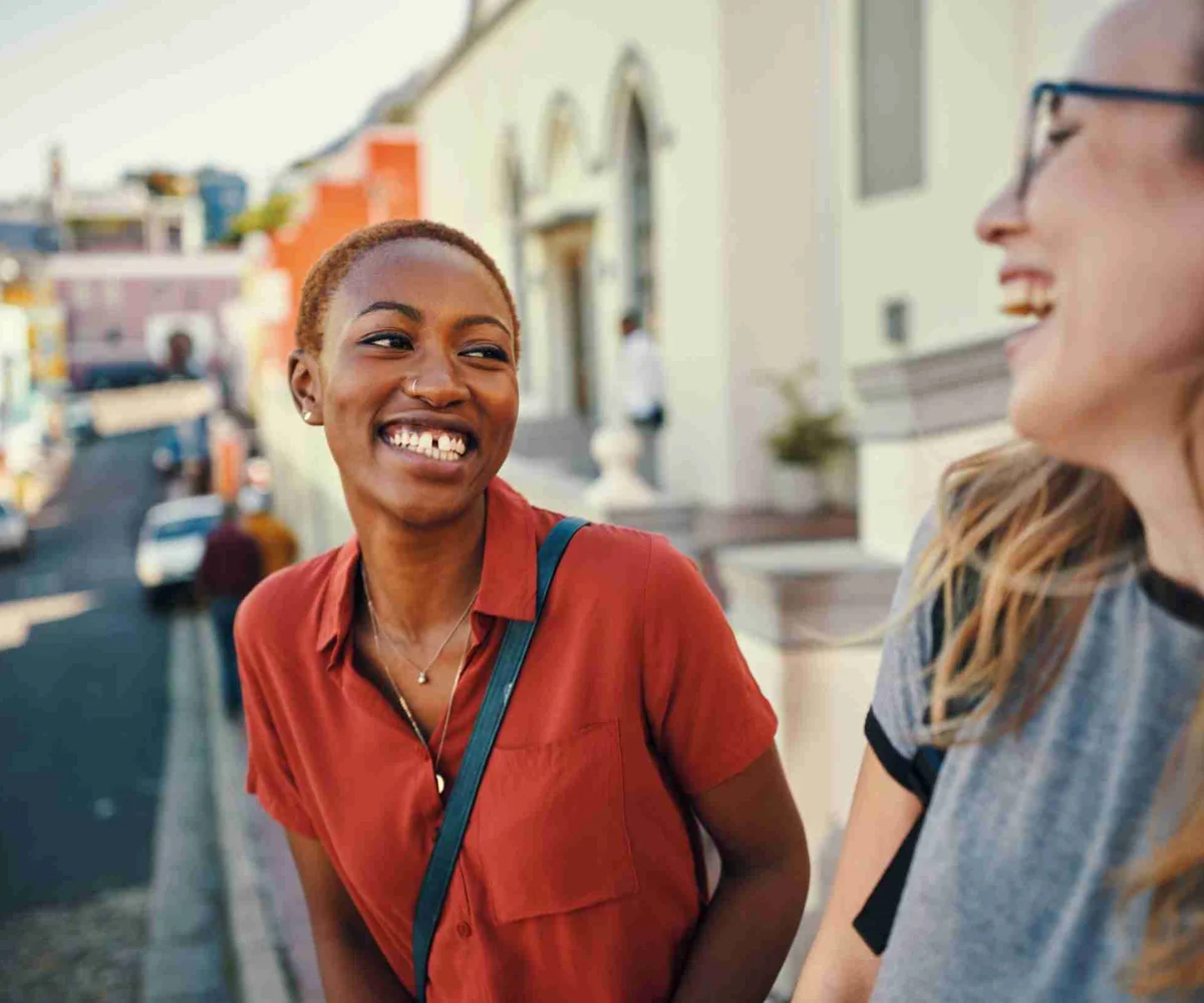 Two Women on the road Laughing