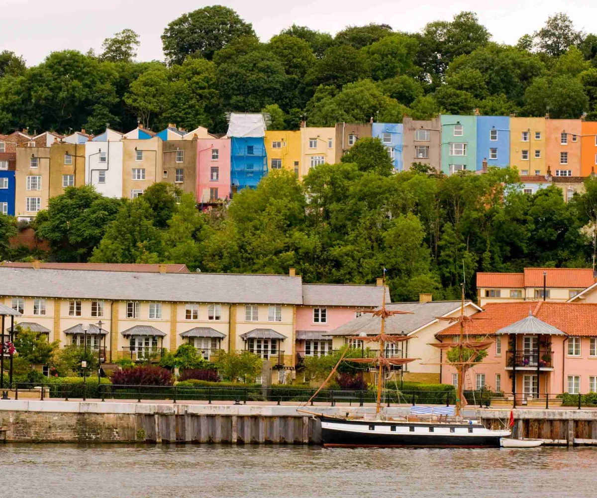 Photo Of Bristol Harbour With Rows Of Coloured Houses In The Background