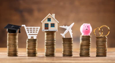 stacks of coins with different figurines on top stacks of coins with different figurines on top