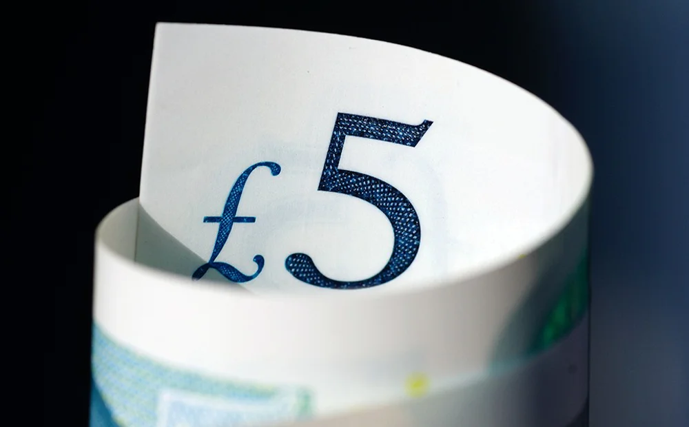 rolled up 5 pound note rolled up 5 pound note